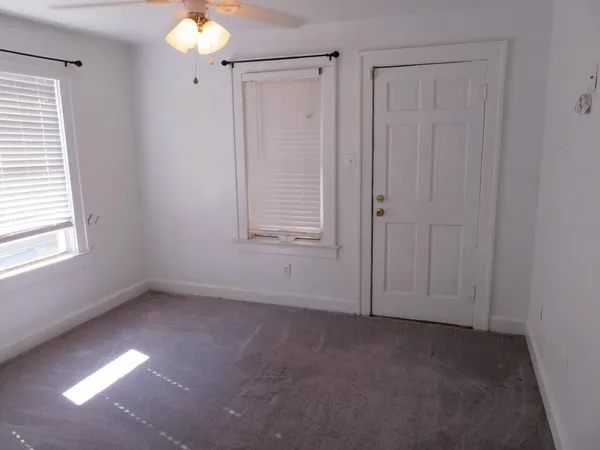 an empty room with windows