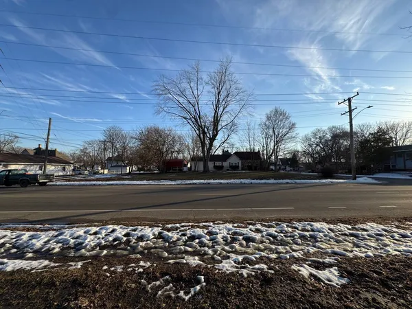 a view of street with view of house