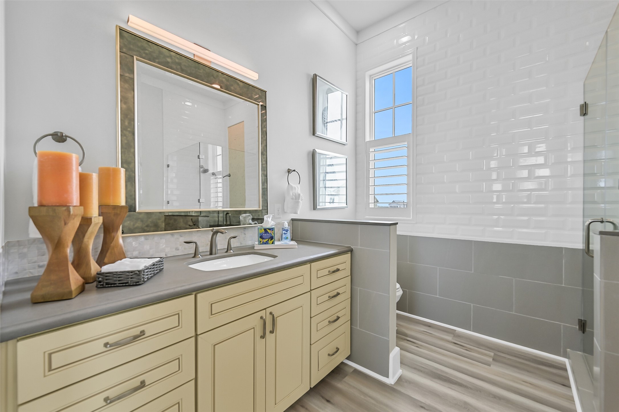 817 Positano Road Galveston, TX 77550 - Photo 24 of 50 Bright, elegant, and designed for relaxation, the primary bath delivers a spa-like experience at home. Refined finishes and natural light create a peaceful space to refresh and recharge.