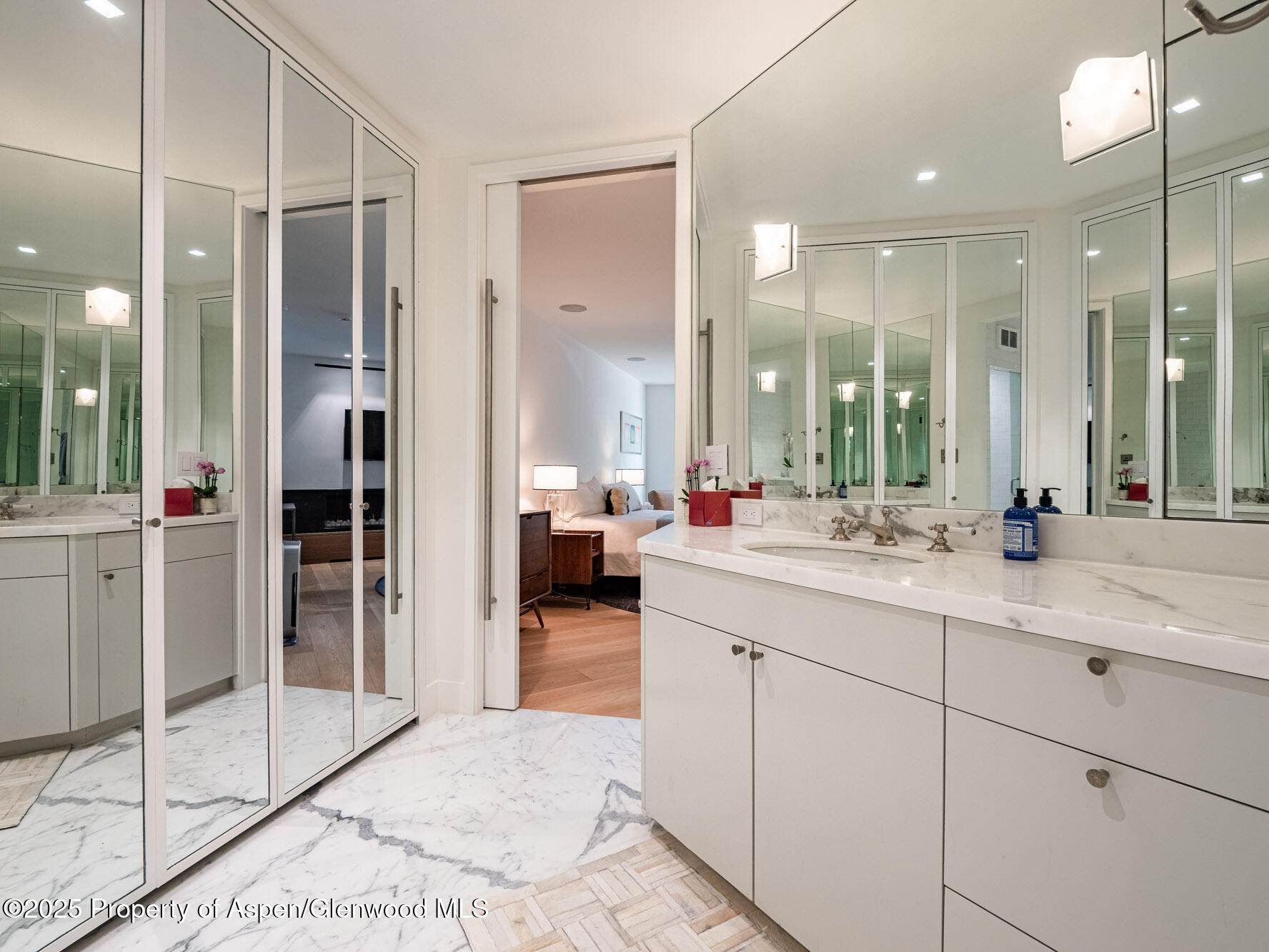 1440 Crystal Lake Road Aspen, CO 81611 - Photo 16 of 44 a bathroom with a double vanity sink shower and a mirror