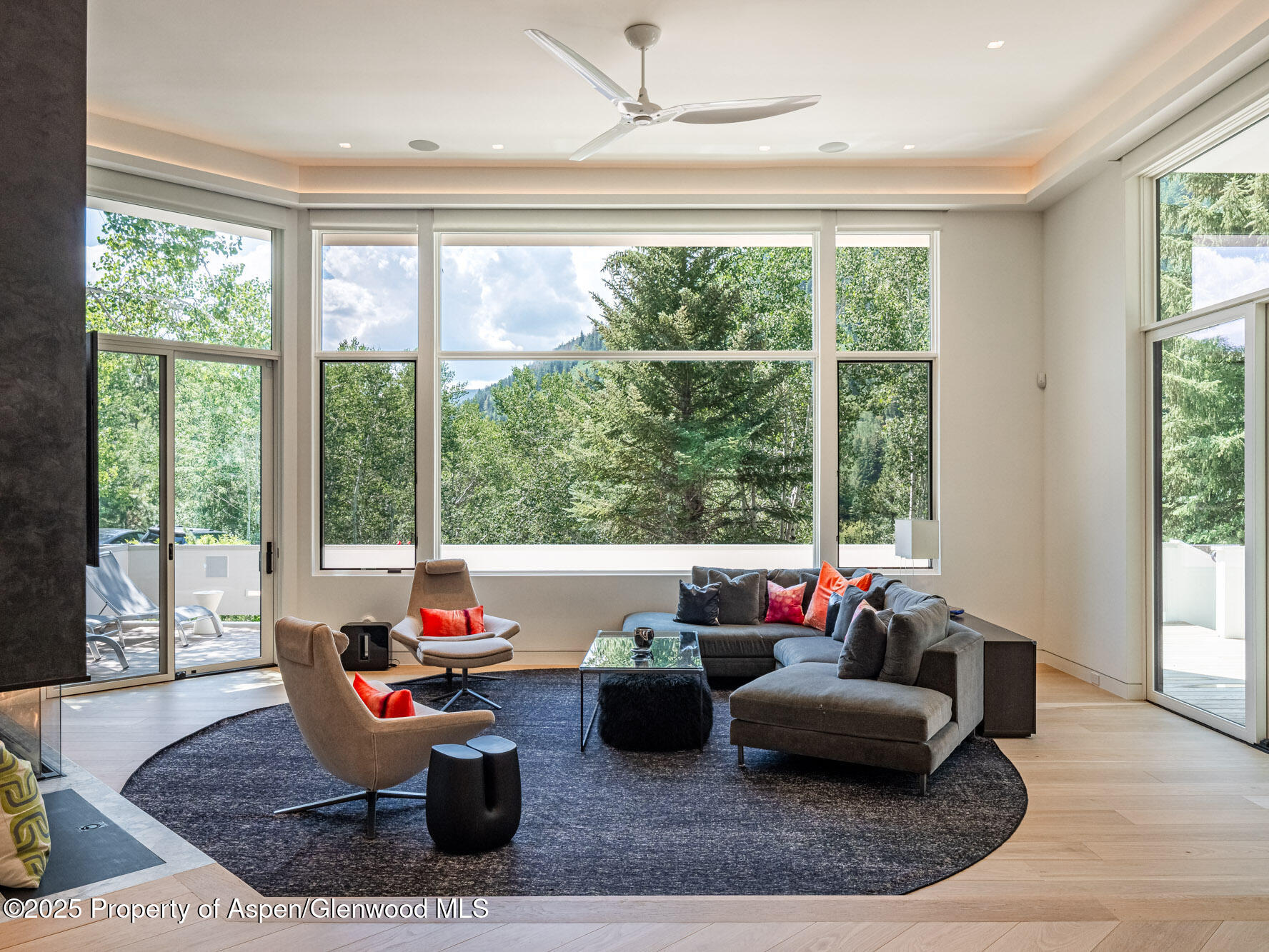 1440 Crystal Lake Road Aspen, CO 81611 - Photo 3 of 44 a living room with furniture and a large window