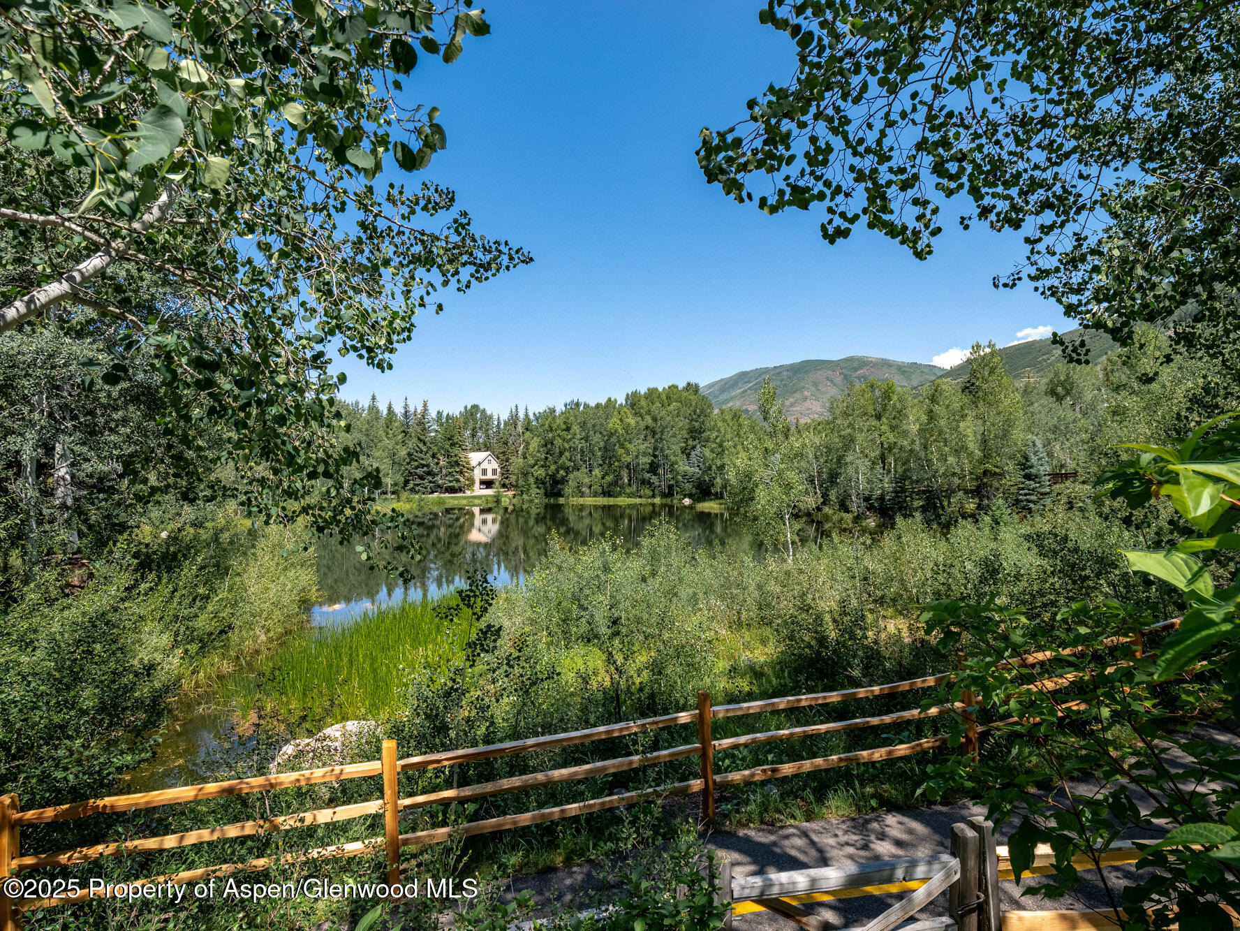1440 Crystal Lake Road Aspen, CO 81611 - Photo 34 of 44 a view of a lake from a balcony