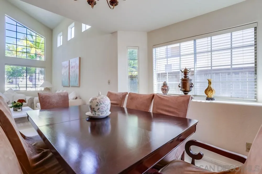 3243 San Tomas Drive Oceanside, CA 92056 - Photo 14 of 45 a view of a dining room with furniture and a large window
