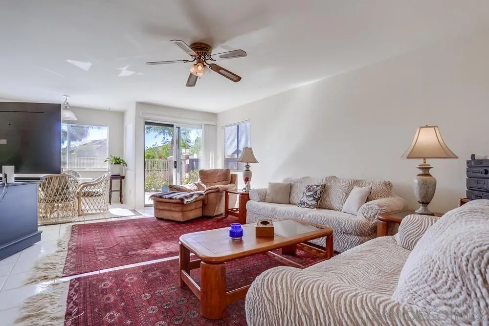 3243 San Tomas Drive Oceanside, CA 92056 - Photo 17 of 45 a living room with furniture and a large mirror