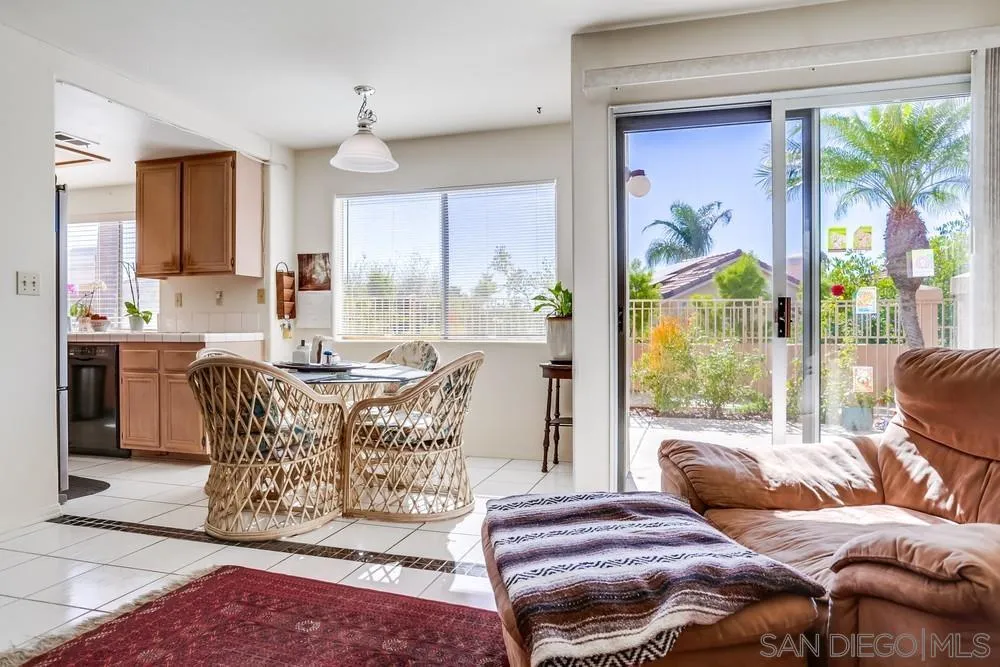 3243 San Tomas Drive Oceanside, CA 92056 - Photo 20 of 45 a living room with furniture and a large window
