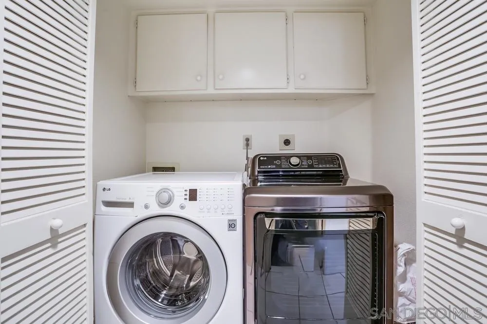 3243 San Tomas Drive Oceanside, CA 92056 - Photo 26 of 45 a stove top oven sitting inside of a kitchen