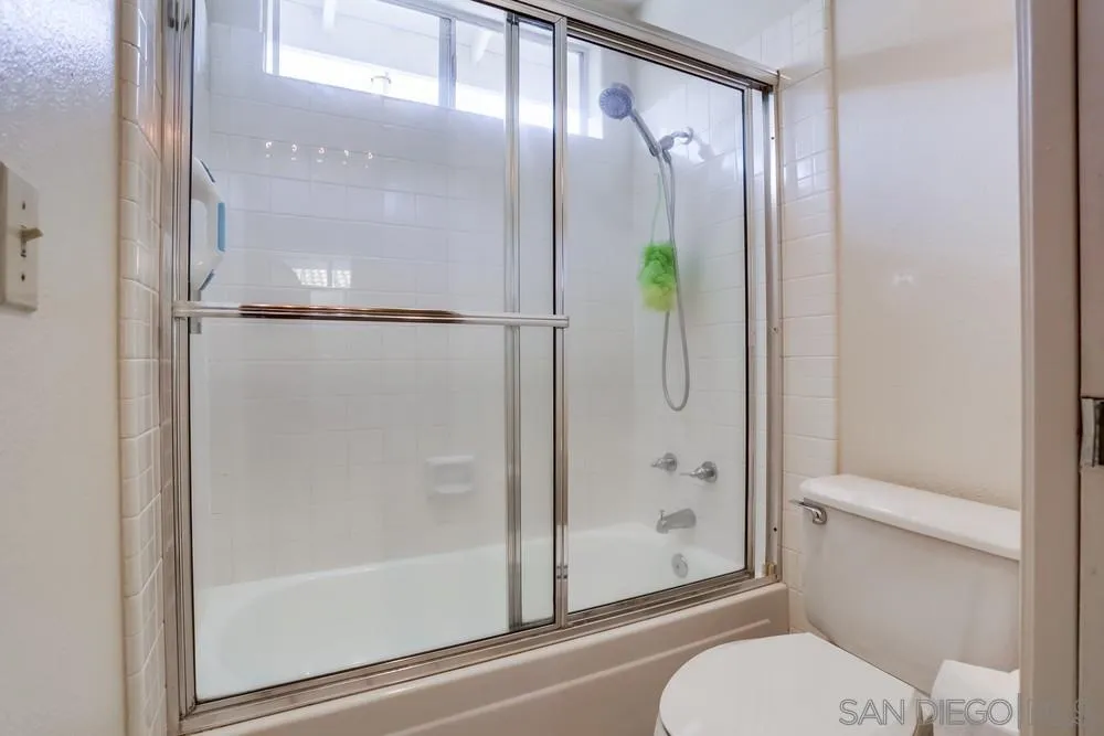 3243 San Tomas Drive Oceanside, CA 92056 - Photo 32 of 45 a bathroom with a shower and toilet