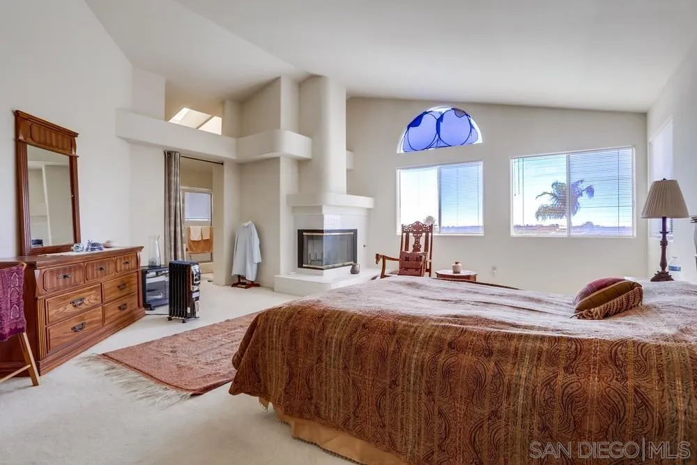 3243 San Tomas Drive Oceanside, CA 92056 - Photo 37 of 45 a bedroom with a bed and dresser