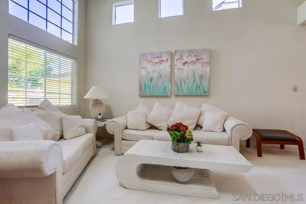 3243 San Tomas Drive Oceanside, CA 92056 - Photo 9 of 45 a living room with furniture and a large window