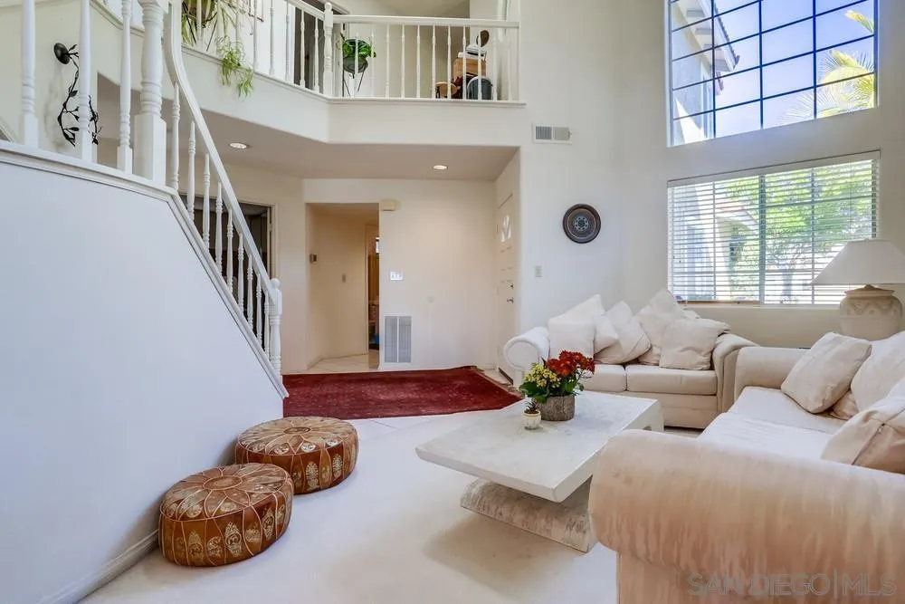 3243 San Tomas Drive Oceanside, CA 92056 - Photo 10 of 45 a living room with furniture chess board and a window