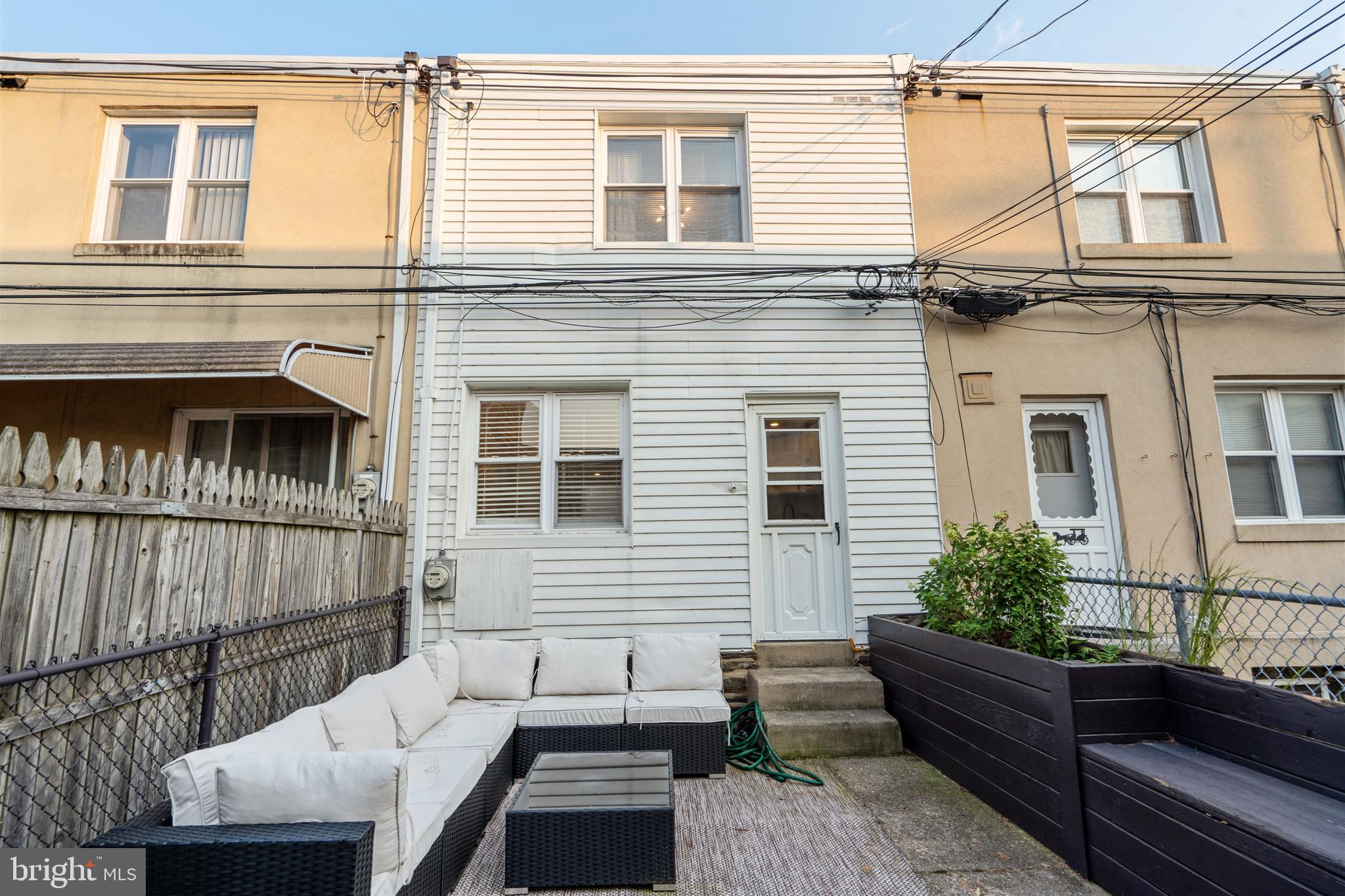 3606 Miller Street Philadelphia, PA 19134 - Photo 19 of 24 a view of a house with a large window and wooden floor
