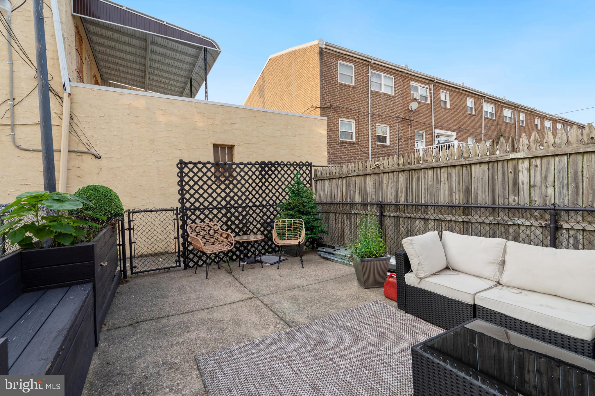 3606 Miller Street Philadelphia, PA 19134 - Photo 20 of 24 a view of a chairs and table in the back yard of the house