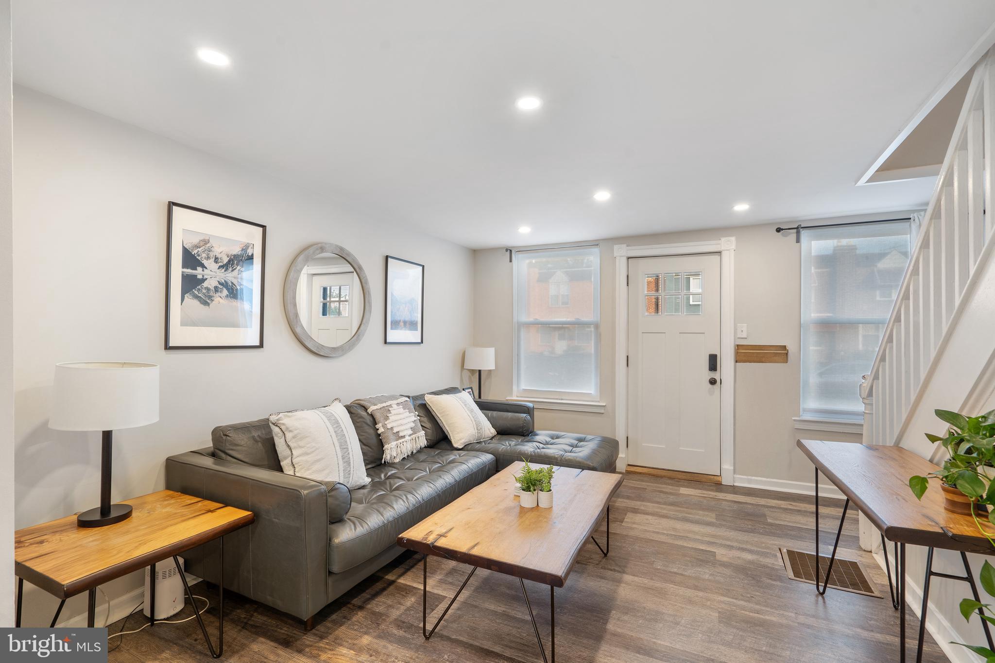 3606 Miller Street Philadelphia, PA 19134 - Photo 8 of 24 a living room with furniture and a wooden floor