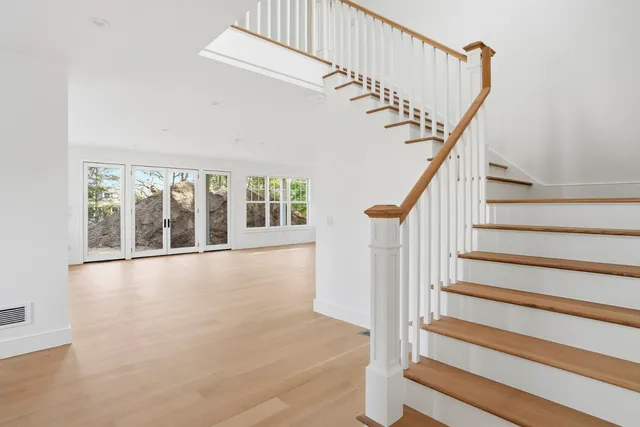 a view of staircase with white walls and white walls