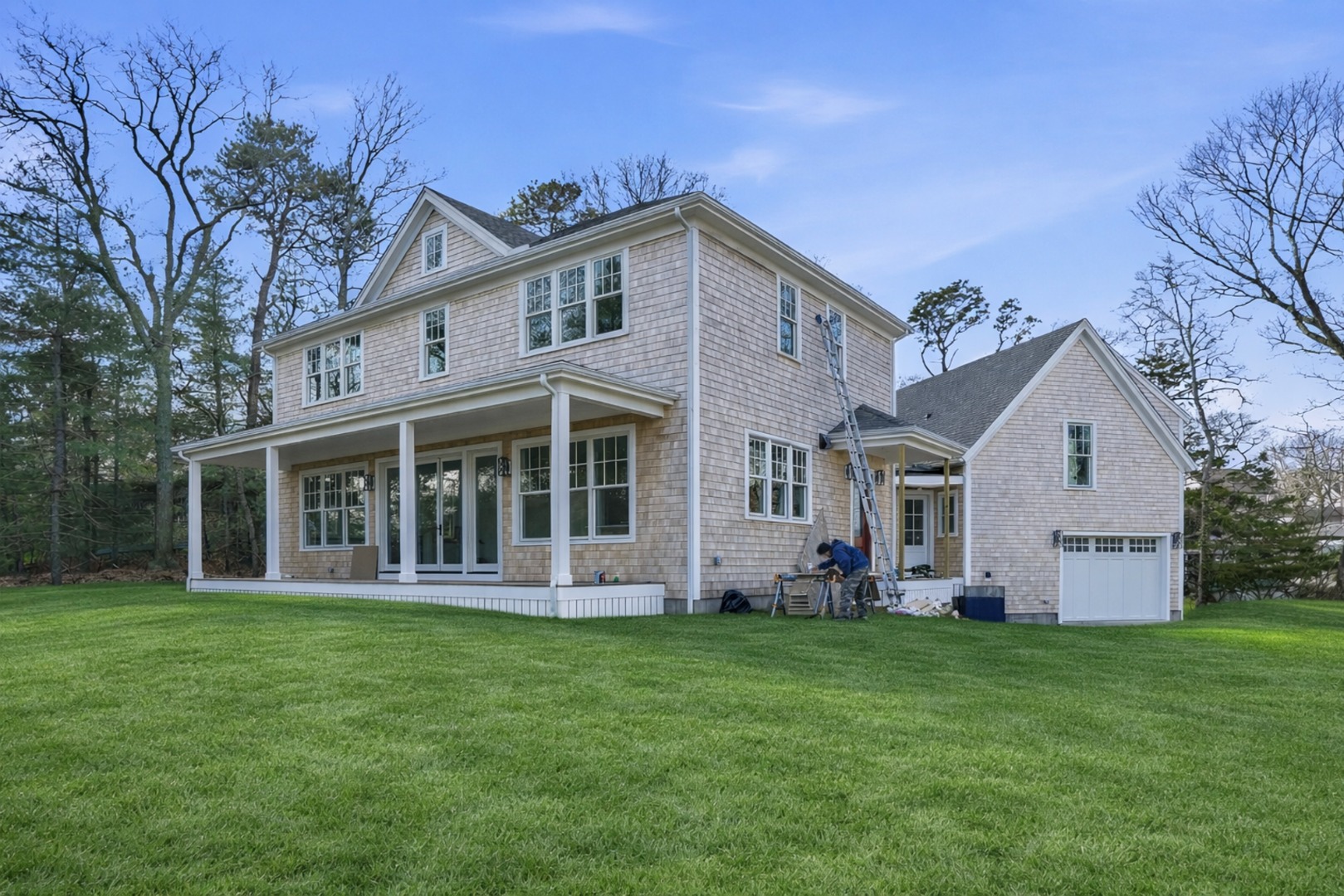 35 Mt Aldworth Road Vineyard Haven, MA 02568 - Photo 2 of 41 a front view of a house with a yard