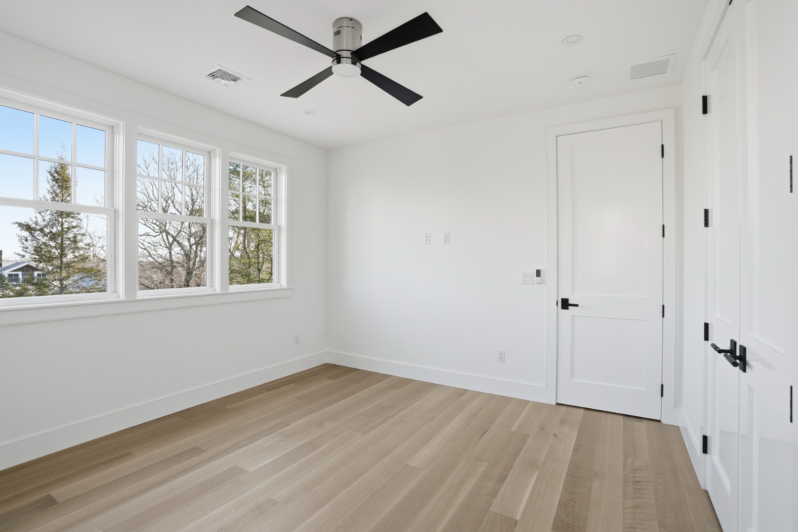 35 Mt Aldworth Road Vineyard Haven, MA 02568 - Photo 24 of 41 a view of a room with wooden floor and windows