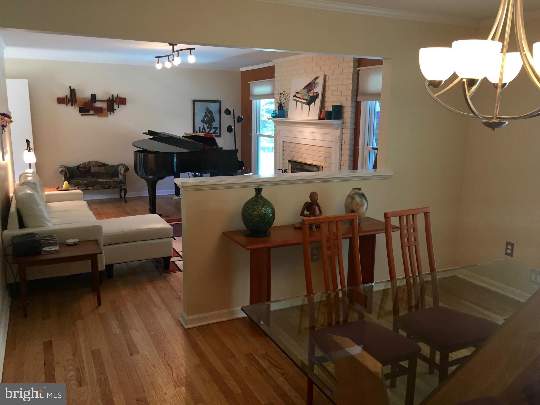 2914 York Manor Road Phoenix, MD 21131 - Photo 12 of 28 Dining Room With Wood Floor Adjoins Living Room