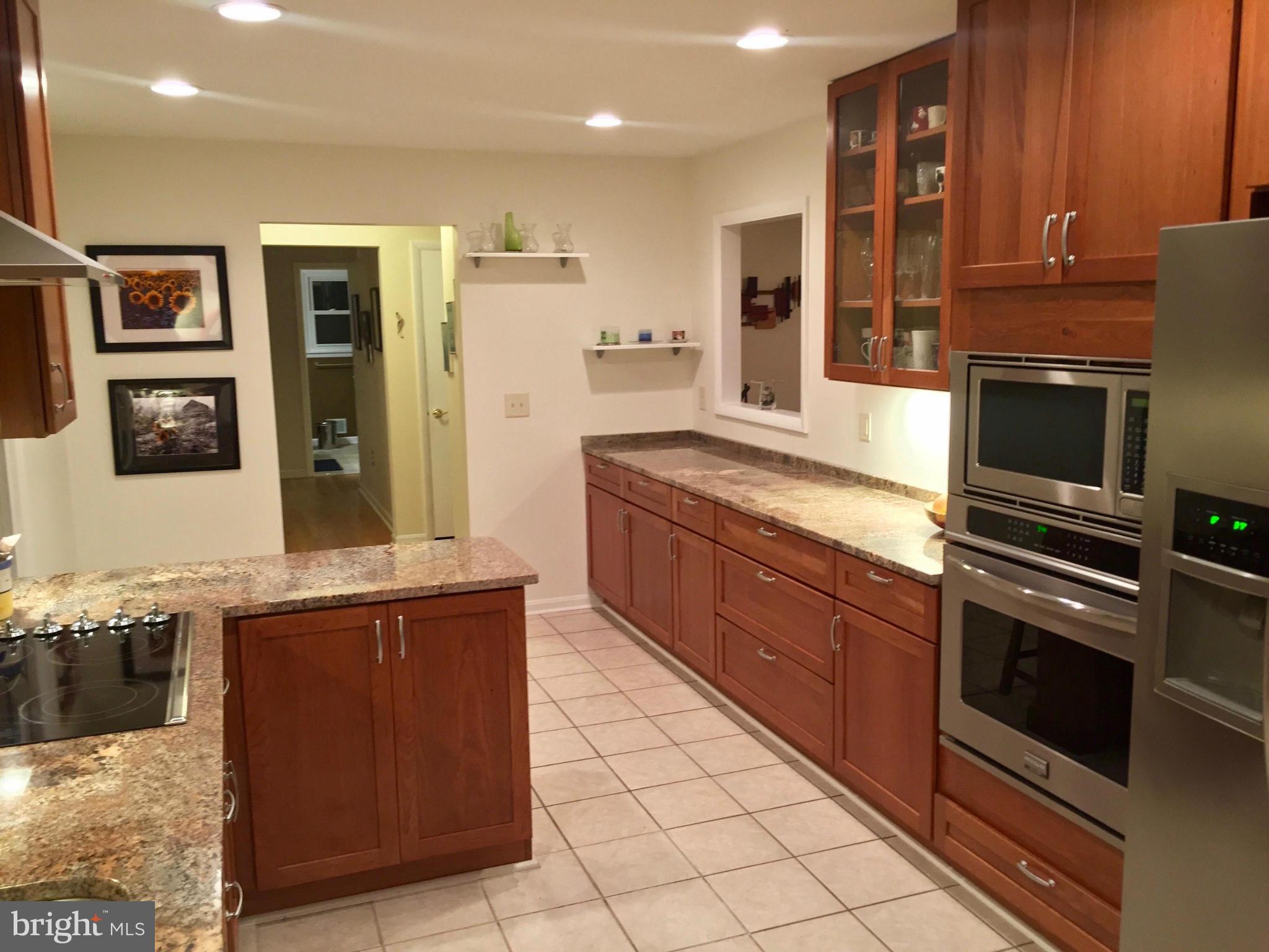 2914 York Manor Road Phoenix, MD 21131 - Photo 8 of 28 Recessed Lights & Ceramic Tile Floor In Kitchen