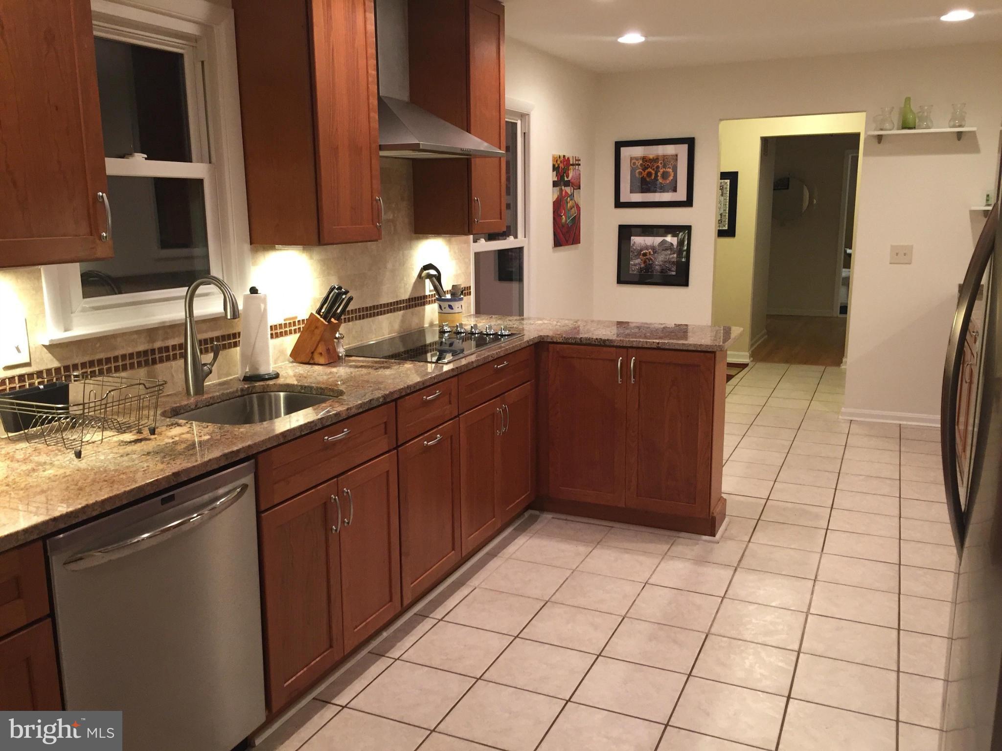 2914 York Manor Road Phoenix, MD 21131 - Photo 9 of 28 St Steel Appliances & Granite Counters In Kitchen