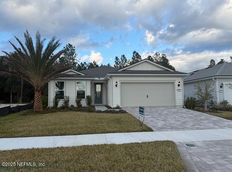 134 Headstream Drive St. Johns, FL 32259 - Photo 1 of 28 a front view of a house with a yard