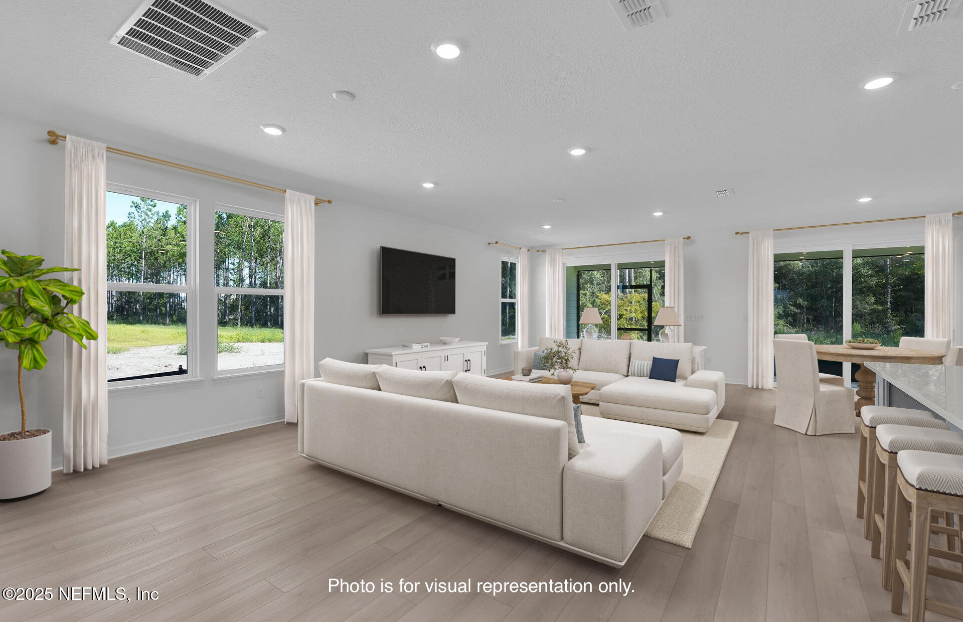 134 Headstream Drive St. Johns, FL 32259 - Photo 10 of 28 a living room with furniture and a flat screen tv