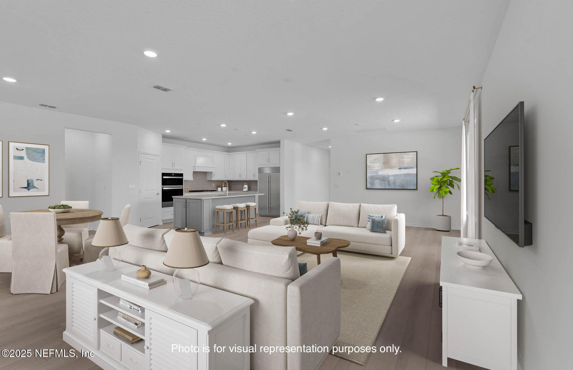 134 Headstream Drive St. Johns, FL 32259 - Photo 12 of 28 a living room with furniture a flat screen tv and a large window