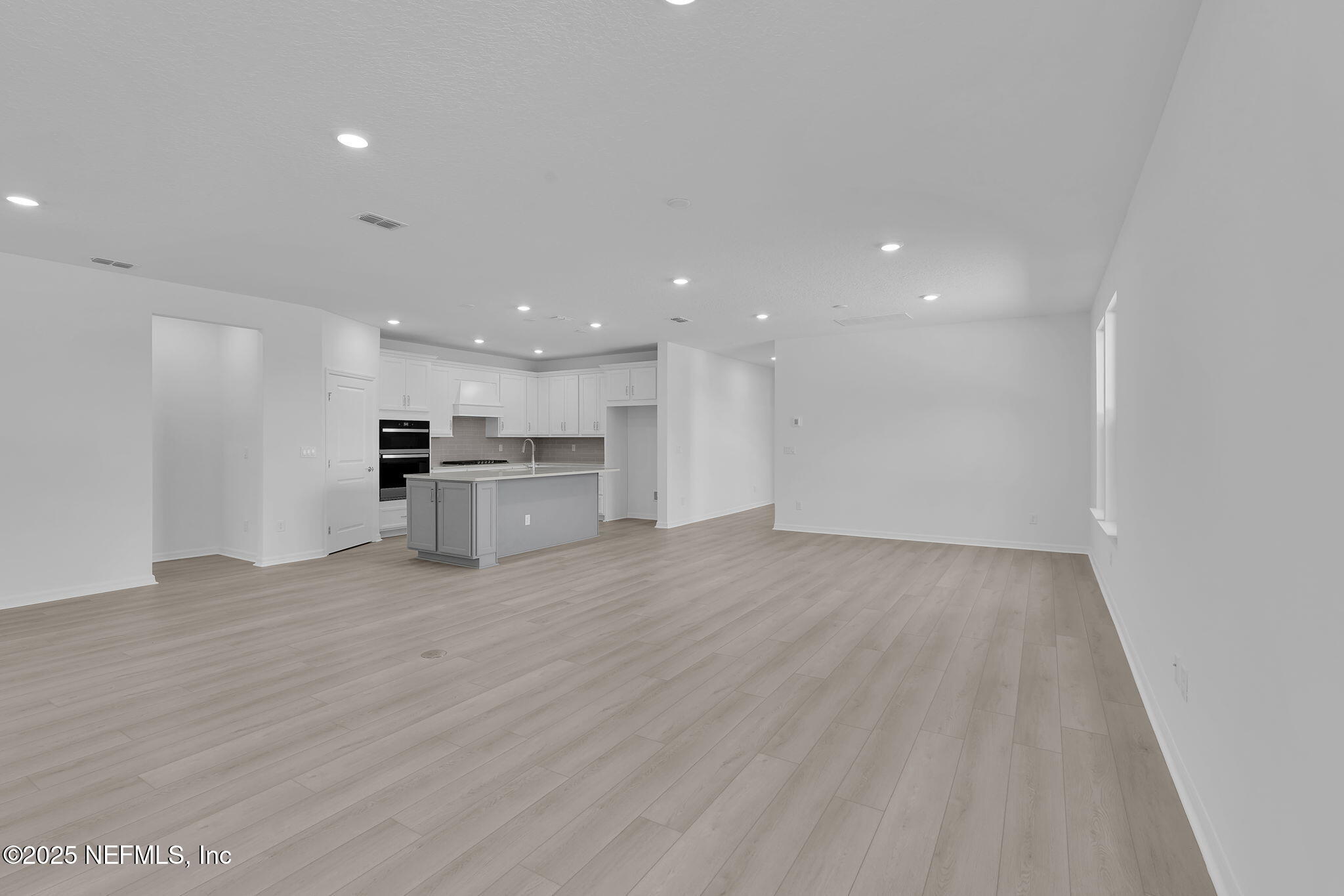 134 Headstream Drive St. Johns, FL 32259 - Photo 13 of 28 a view of kitchen with kitchen island and stainless steel appliances