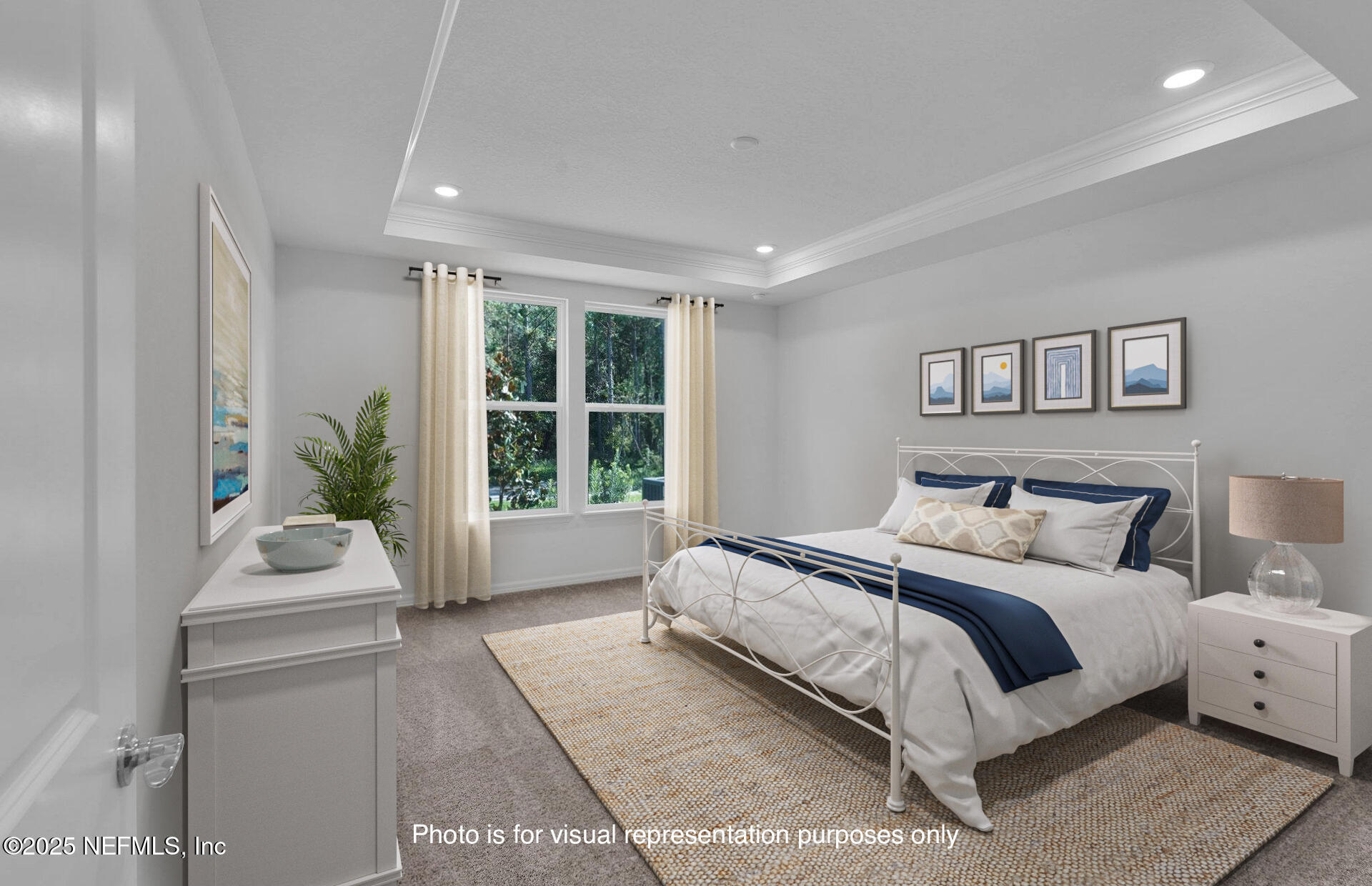 134 Headstream Drive St. Johns, FL 32259 - Photo 14 of 28 a bedroom with a large bed and a potted plant