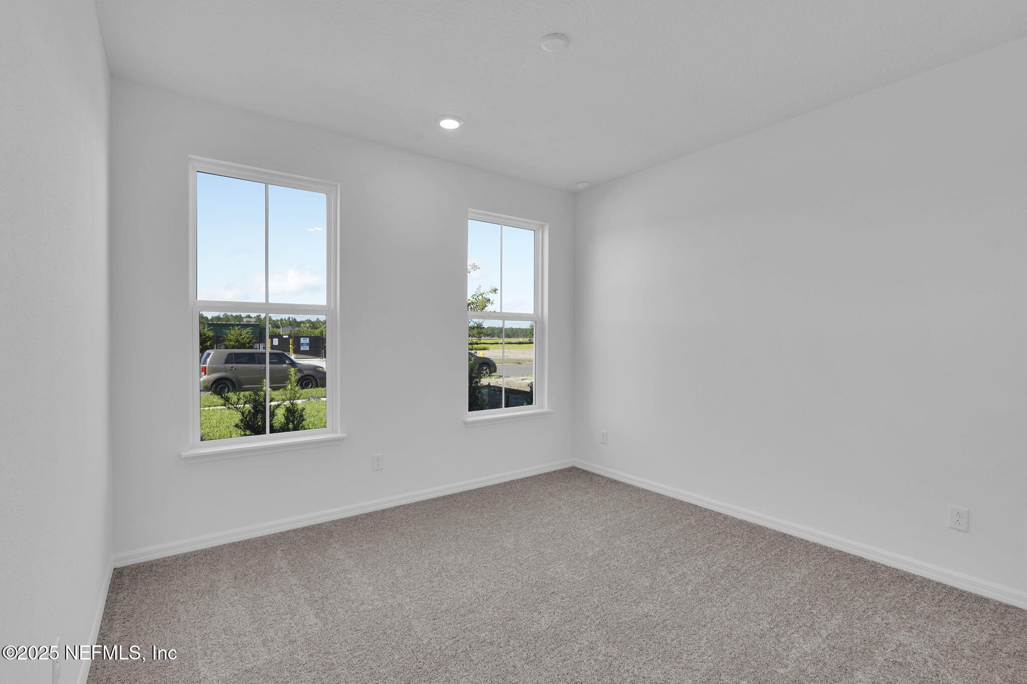 134 Headstream Drive St. Johns, FL 32259 - Photo 18 of 28 an empty room with windows