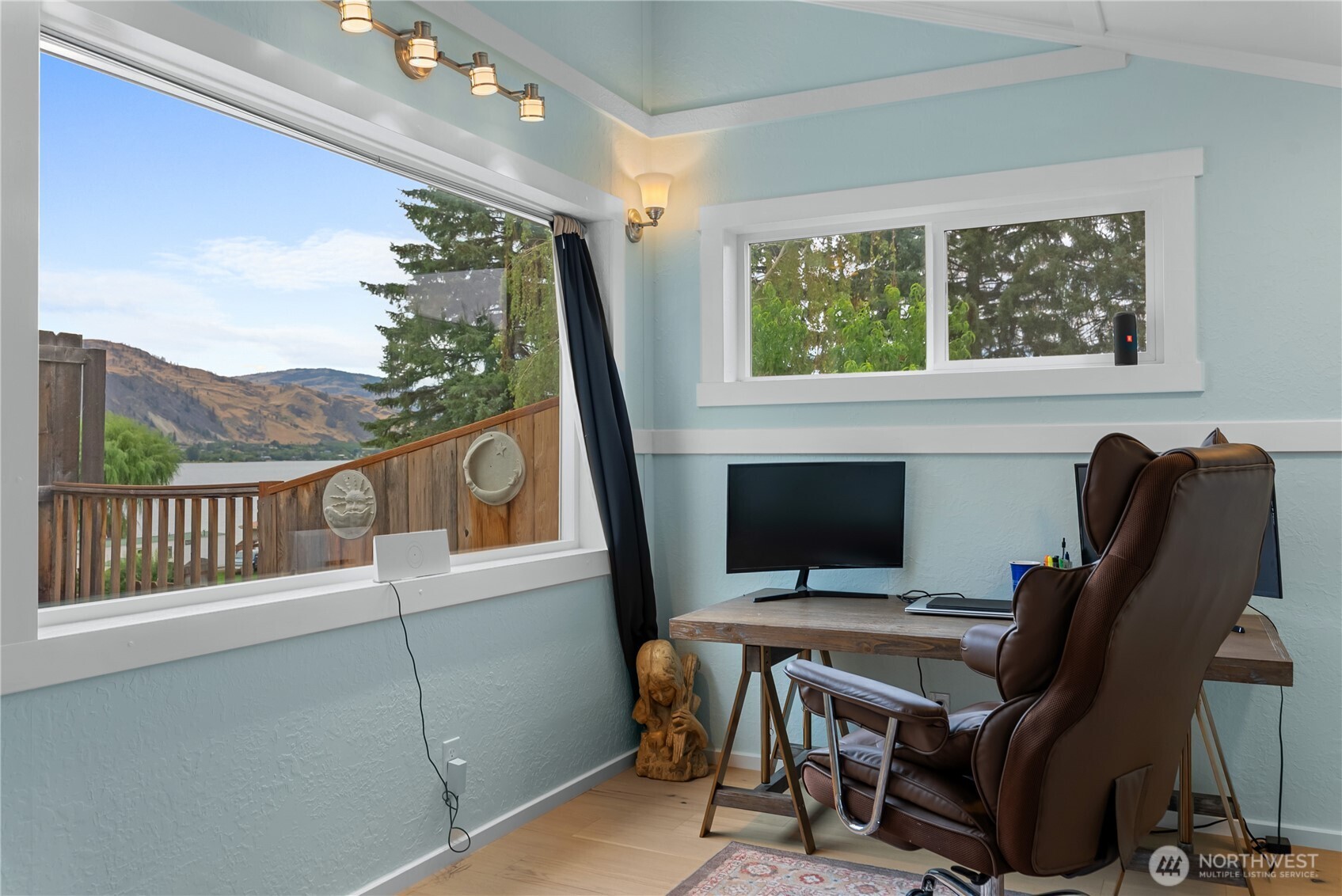 65 Eastlake Road, Unit B Oroville, WA 98844 - Photo 25 of 40 a view of a workspace with furniture and a window