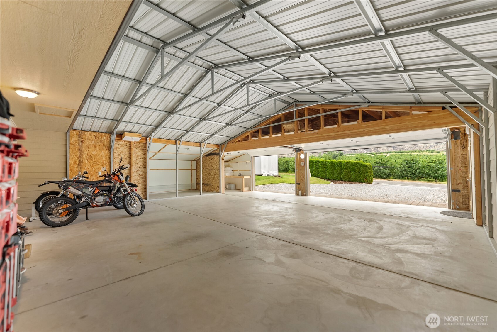 65 Eastlake Road, Unit B Oroville, WA 98844 - Photo 38 of 40 a view of a car garage of a house