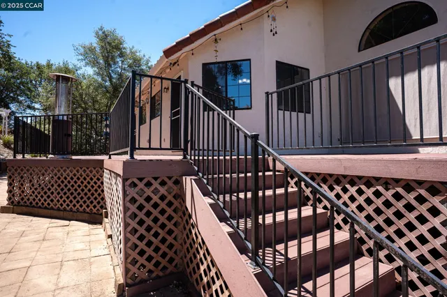 a front view of a house with a patio
