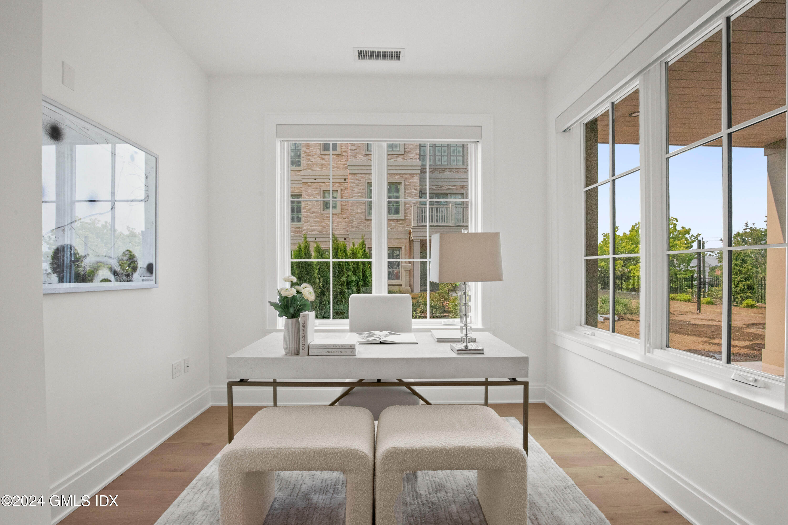 71 Havemeyer Place, Unit 303S Greenwich, CT 06830 - Photo 14 of 26 a dining room with a large window and table