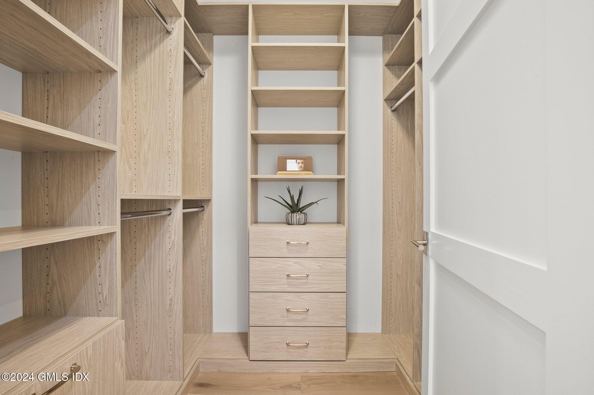 71 Havemeyer Place, Unit 303S Greenwich, CT 06830 - Photo 19 of 26 a view of an empty walk in closet