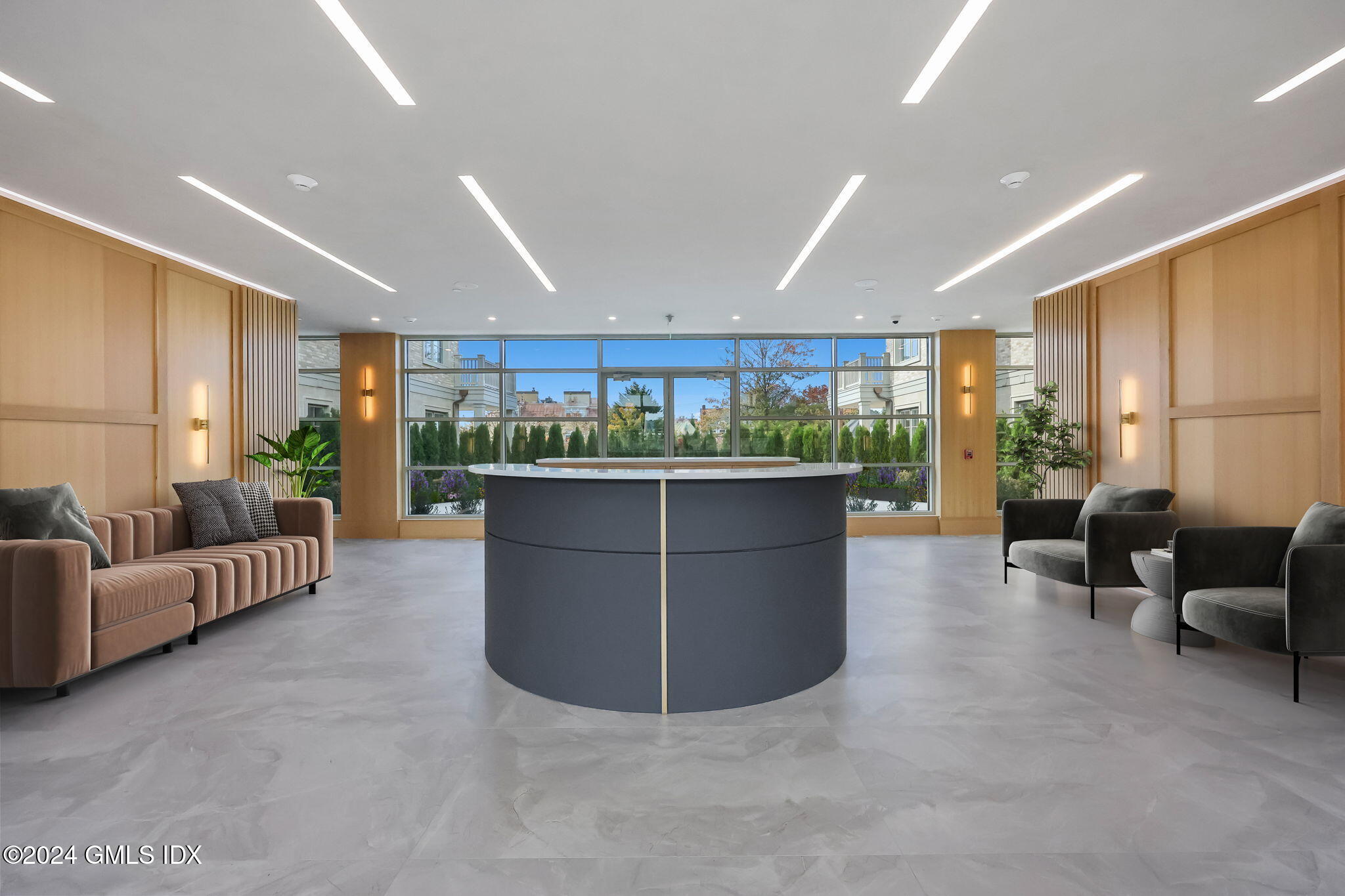 71 Havemeyer Place, Unit 303S Greenwich, CT 06830 - Photo 2 of 26 a living room with couches and kitchen view