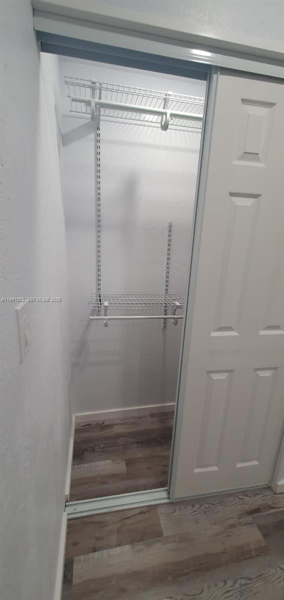 21600 Southwest 260th Street Homestead, FL 33031 - Photo 14 of 23 a view of walk in closet