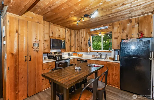 a view of a dining room with furniture window and outside view