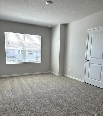 a view of hallway with closet area