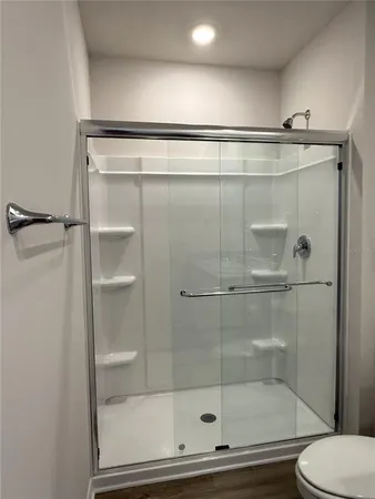 a view of an empty room and closet