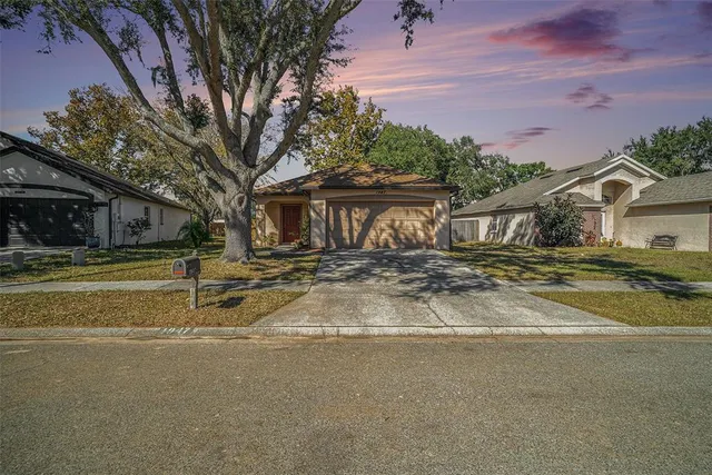a view of a house with a street