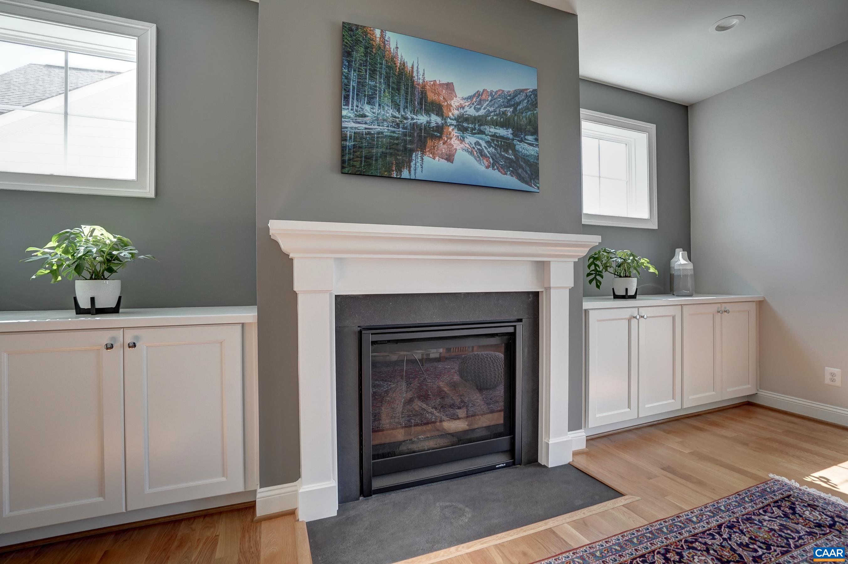424 Claibourne Road Crozet, VA 22932 - Photo 12 of 64 a living room with furniture and a fireplace