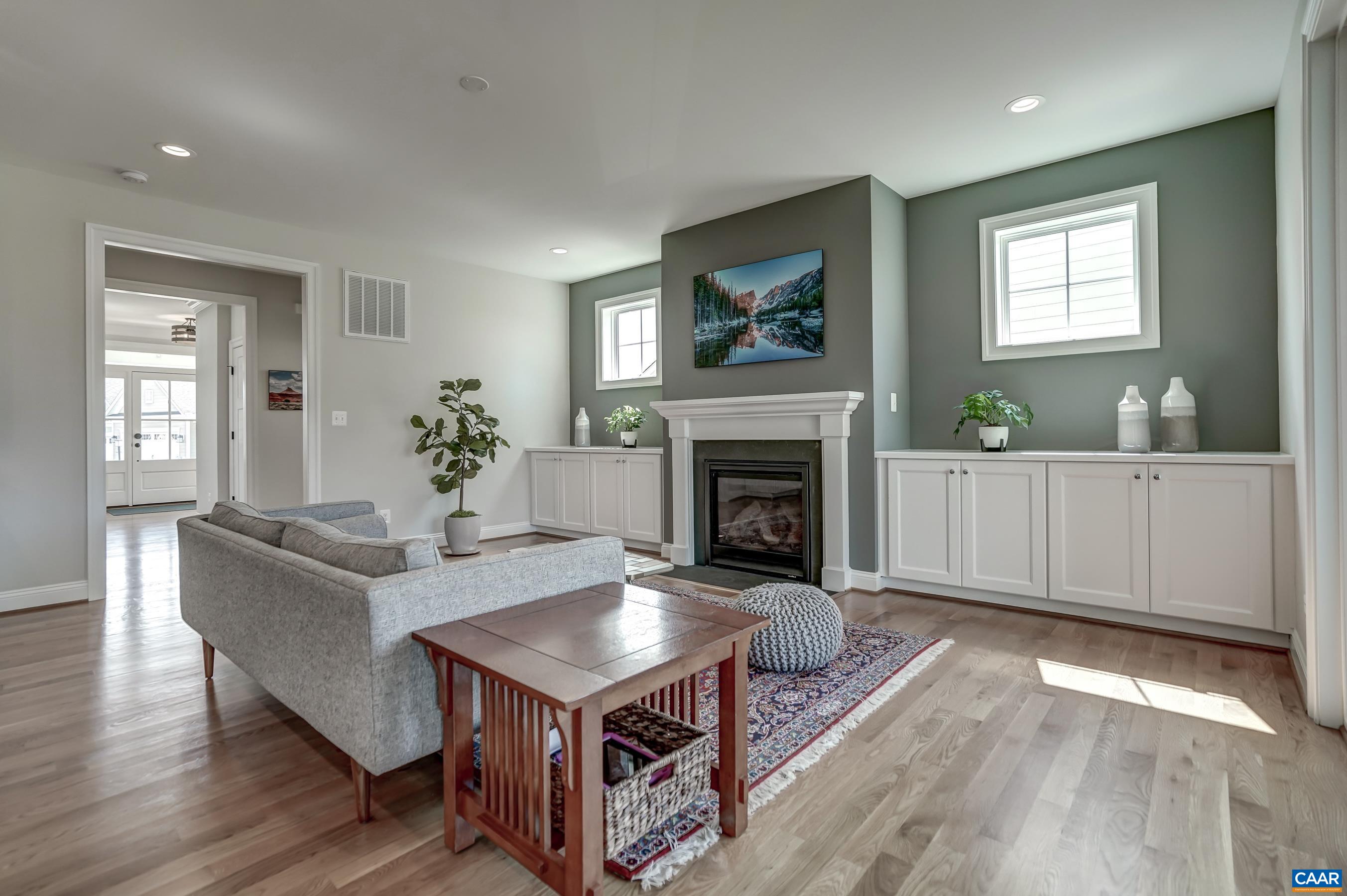 424 Claibourne Road Crozet, VA 22932 - Photo 13 of 64 a living room with furniture and a fireplace