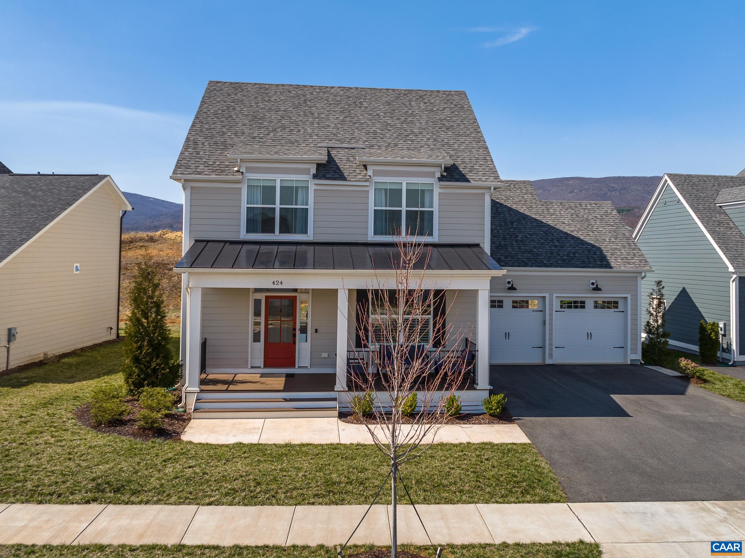 424 Claibourne Road Crozet, VA 22932 - Photo 2 of 64 a front view of a house with garden