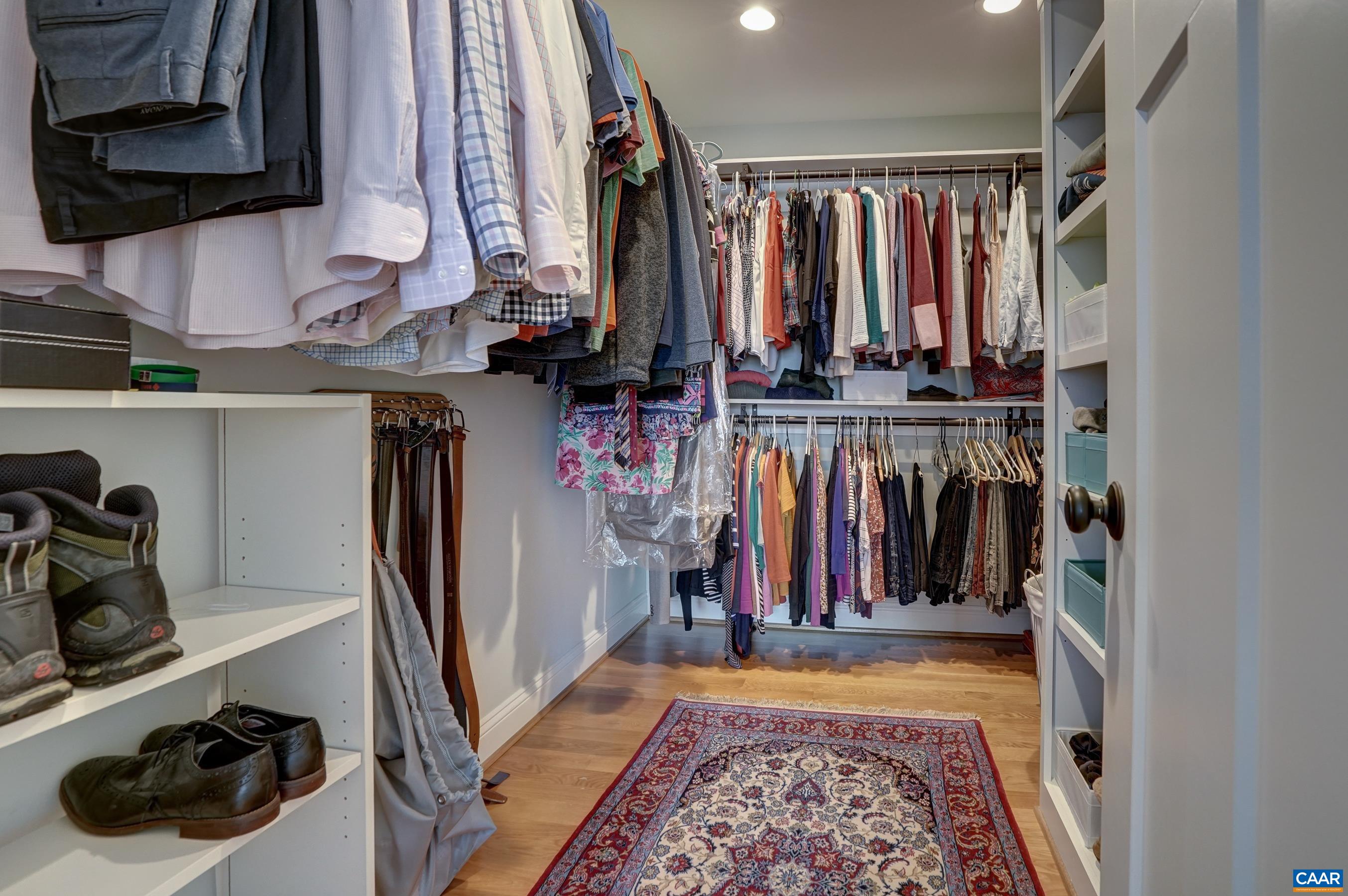 424 Claibourne Road Crozet, VA 22932 - Photo 34 of 64 a view of walk in closet with clothes and shoes