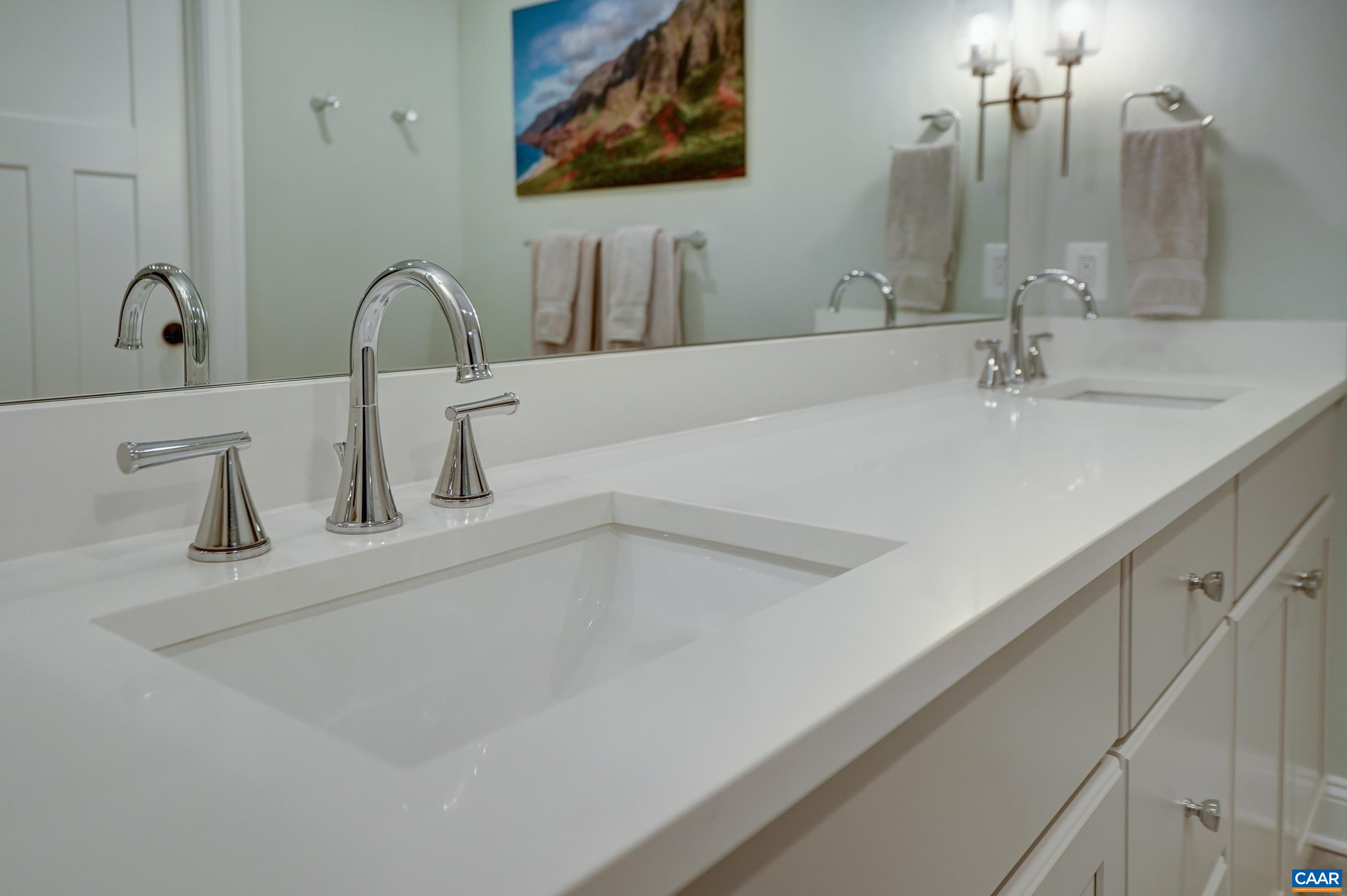 424 Claibourne Road Crozet, VA 22932 - Photo 36 of 64 a bathroom with a sink and a mirror