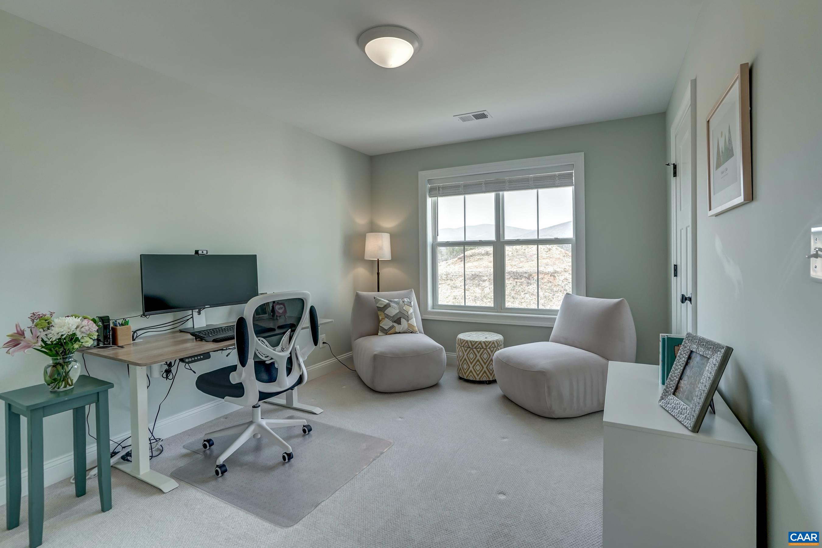 424 Claibourne Road Crozet, VA 22932 - Photo 38 of 64 a room with furniture and a window