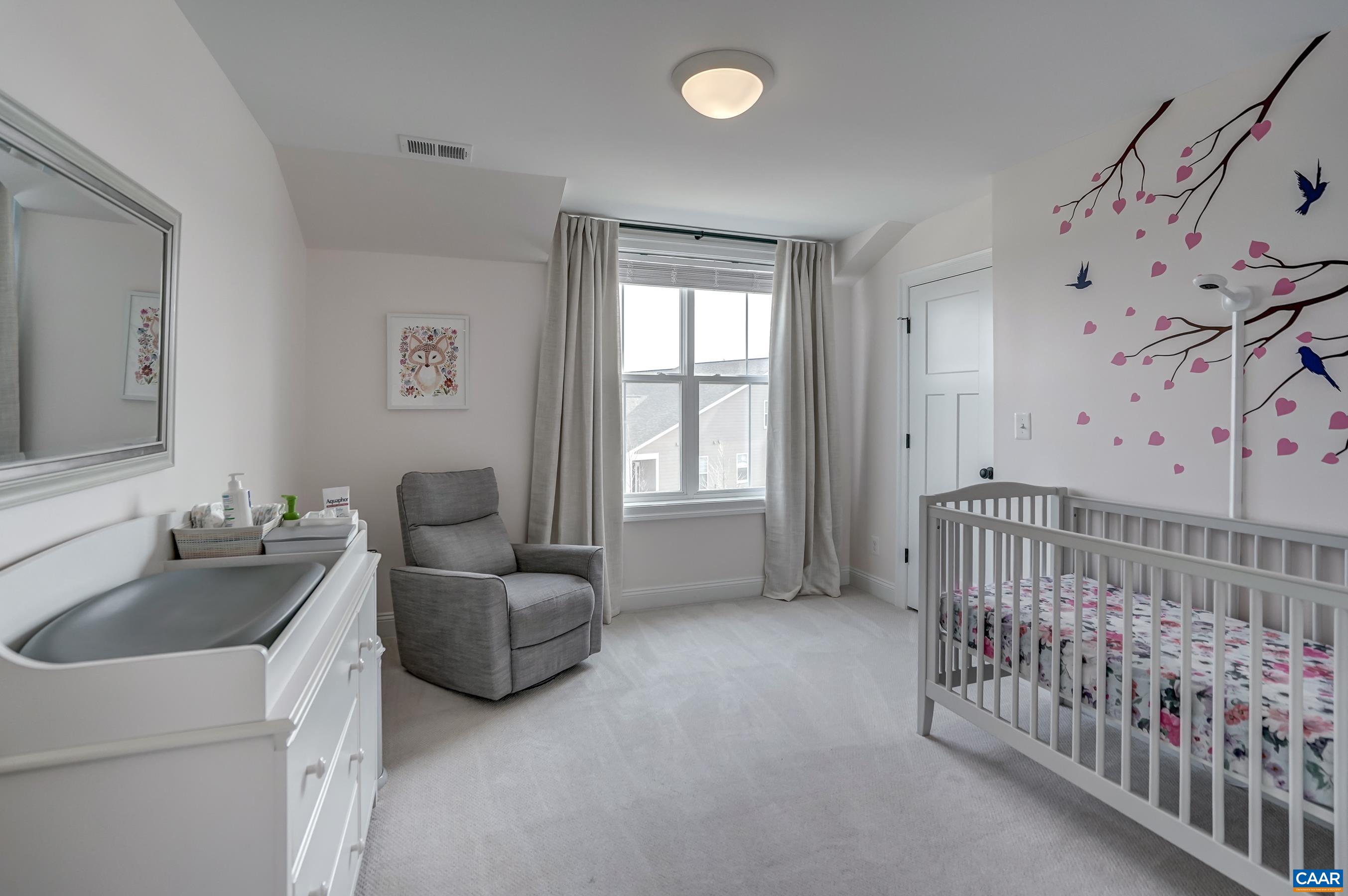 424 Claibourne Road Crozet, VA 22932 - Photo 40 of 64 a bedroom with furniture and baby crib