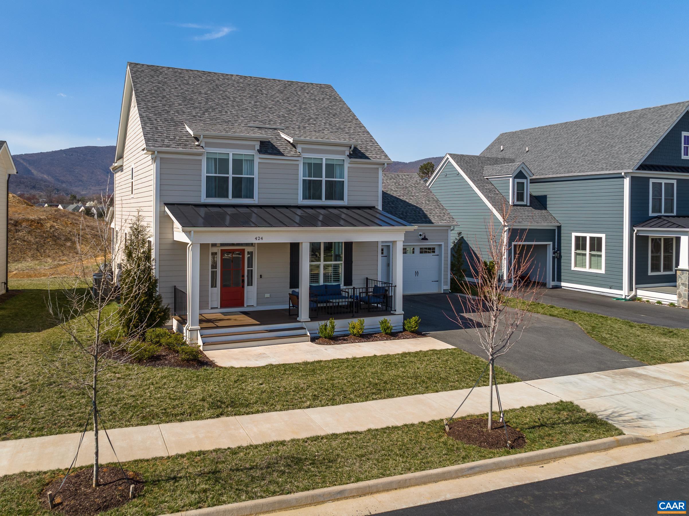 424 Claibourne Road Crozet, VA 22932 - Photo 59 of 64 a front view of a house with garden