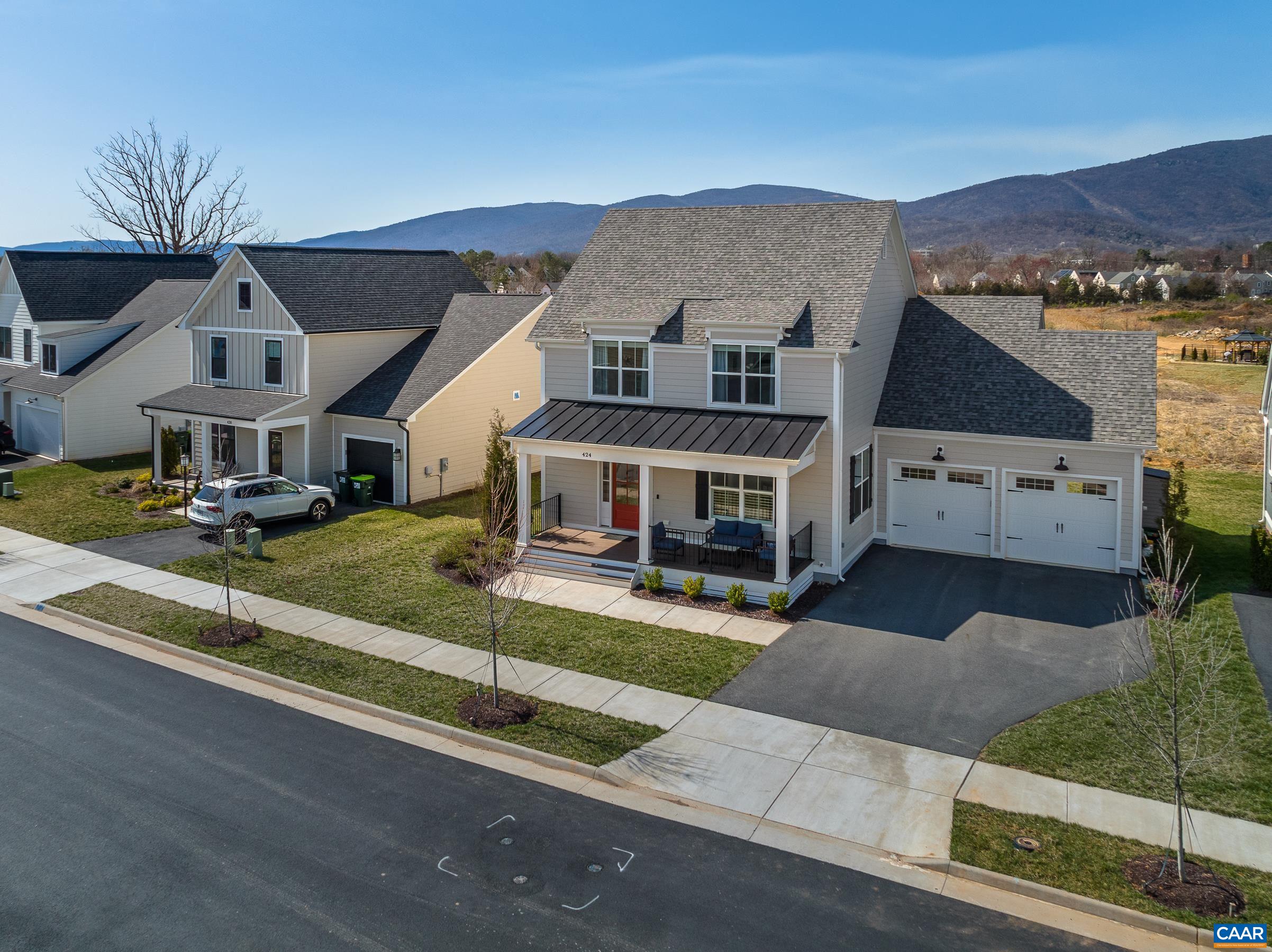 424 Claibourne Road Crozet, VA 22932 - Photo 61 of 64 a front view of houses with yard