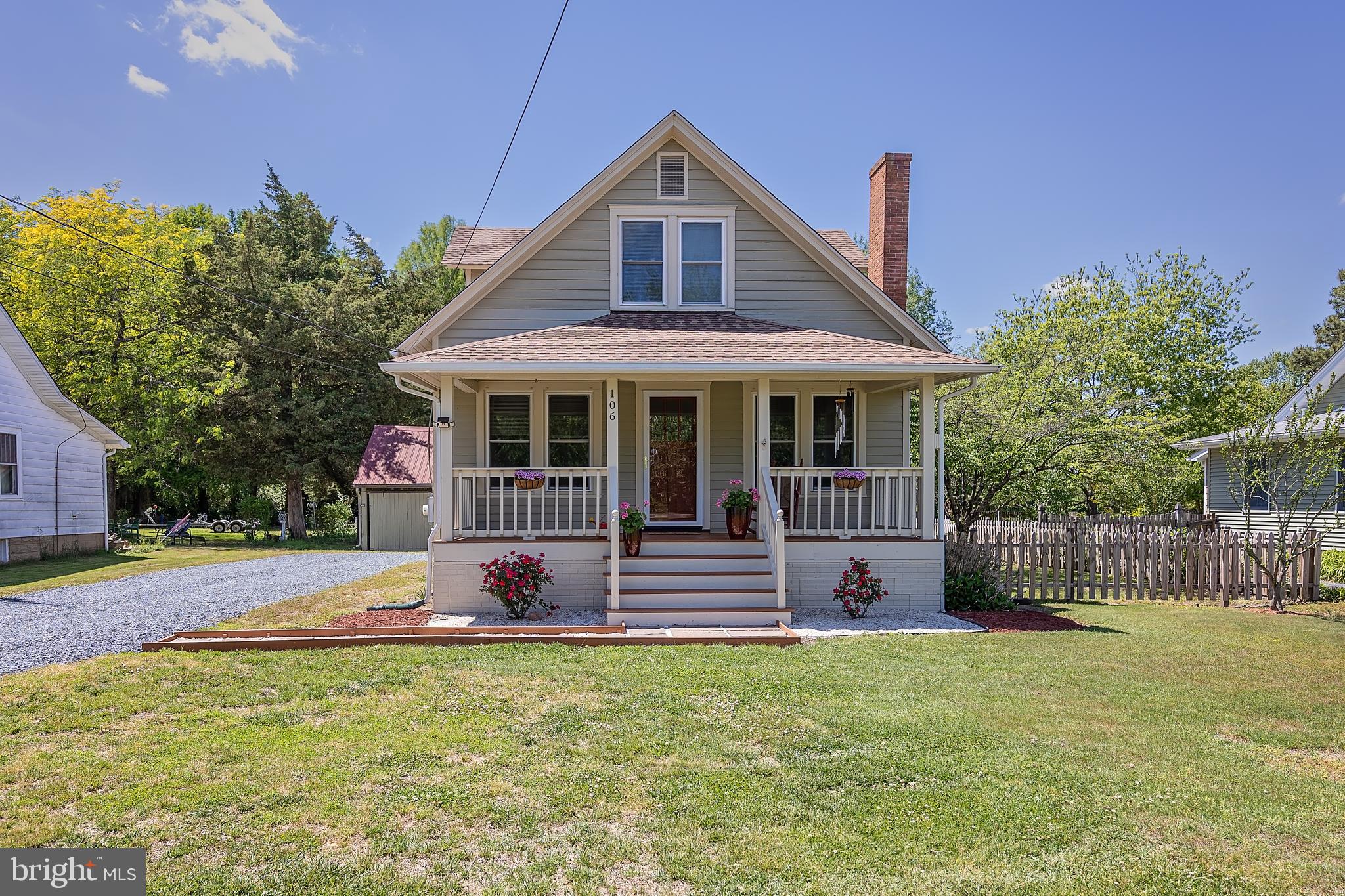 106 Main Street Preston, MD 21655 - Photo 3 of 31 a front view of a house with garden